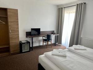 Postel nebo postele na pokoji v ubytování Motel R10