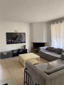 Et opholdsområde på Villas du Golf Domaine Royal Green