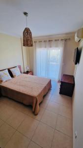 A bed or beds in a room at Sofiamarholidays- Casa levante