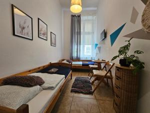 Postel nebo postele na pokoji v ubytování Deja Vu Hostel