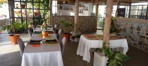 Restoran või mõni muu söögikoht majutusasutuses Pipi's Guest House