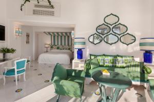 Letto o letti in una camera di Il San Pietro di Positano