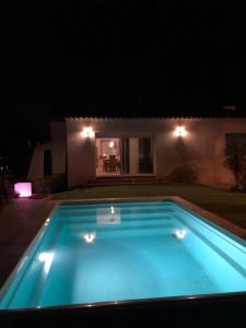 Bazén v ubytování Villa 3 chambres avec piscine privée nebo v jeho okolí