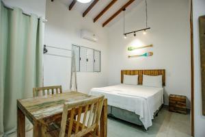 Cama ou camas em um quarto em Flats de Sumatra