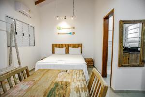 Cama ou camas em um quarto em Flats de Sumatra