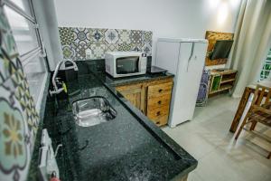 A cozinha ou cozinha compacta de Flats de Sumatra