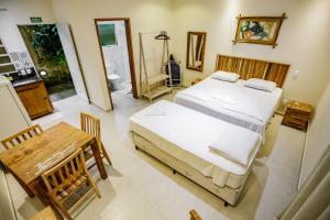 Cama ou camas em um quarto em Flats de Sumatra