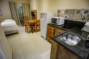 A cozinha ou cozinha compacta de Flats de Sumatra