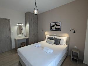 Postel nebo postele na pokoji v ubytování All seasons luxury apartments