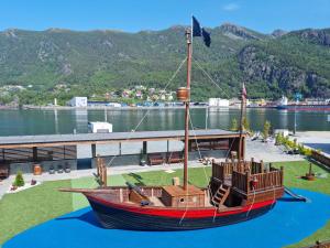 a model of a pirate ship on the water at Bremanger Fjord Hotell in Svelgen