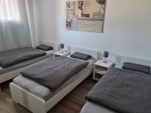 En eller flere senge i et værelse på Wohnung in Herne
