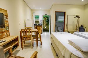 Cama ou camas em um quarto em Flats de Sumatra