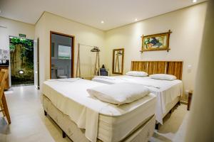 Cama ou camas em um quarto em Flats de Sumatra