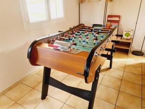 a large billiard table with a pool table at Le Grand Cottage Nature Bien-Etre du Tarn entre Toulouse et Albi & Les Cottages du Tarn in Peyrole