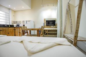 Cama ou camas em um quarto em Flats de Sumatra