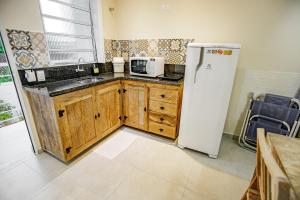 A cozinha ou cozinha compacta de Flats de Sumatra