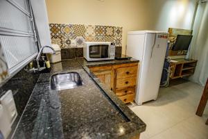 A cozinha ou cozinha compacta de Flats de Sumatra