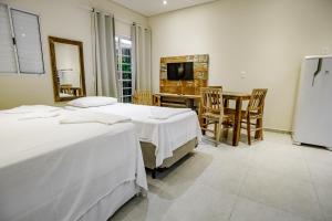 Cama ou camas em um quarto em Flats de Sumatra