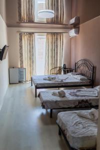Del Mar Koblevo tesisinde bir odada yatak veya yataklar