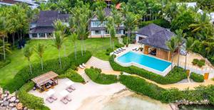 an aerial view of a house with a swimming pool at Sunny Vacation Villa No 37 in San Rafael del Yuma