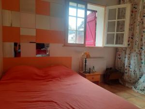 Ένα ή περισσότερα κρεβάτια σε δωμάτιο στο Villa Arcadie