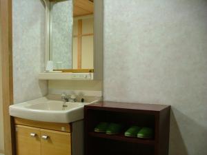 Koupelna v ubytování Miyajima Hotel New Kotobuki + 15 fotografií