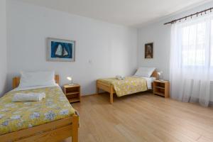 Posteľ alebo postele v izbe v ubytovaní Apartments with WiFi Rovinj - 7144 + 13 fotografií