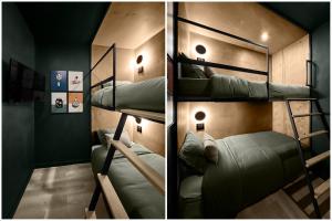 two bunk beds in a room with a couch at 1_OAK - experience custom design - 2 masters in Houston