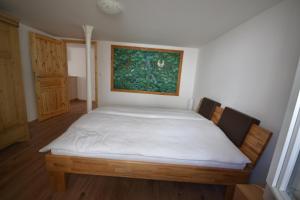 Ein Bett oder Betten in einem Zimmer der Unterkunft Bachperle