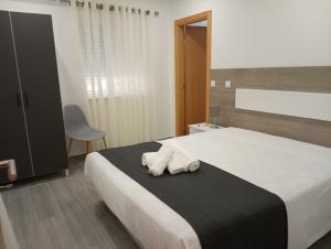Postel nebo postele na pokoji v ubytování Apartamento T2 Salva-Vidas