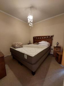 A bed or beds in a room at Departamento buena ubicación y completamente equipado