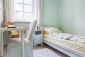 Ein Bett oder Betten in einem Zimmer der Unterkunft Schlafen in Rosengarten
