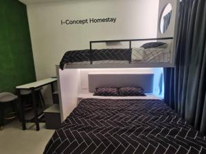 Postel nebo postele na pokoji v ubytování I-Concept Homestay