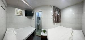 Ένα μπάνιο στο Mandarin Guest House
