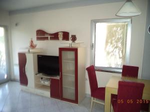 TV a/nebo společenská místnost v ubytování Apartmans Teodora, Star Dojran