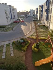 a view of a street with buildings and a park at Departamento-Poliforum Feria Estadio Zona Piel. in León