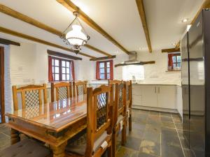 Kuchyň nebo kuchyňský kout v ubytování Samuels Cottage