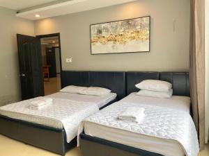 Ein Bett oder Betten in einem Zimmer der Unterkunft Welcome You to Vung Tau 2 bedroon with Nice Sea View