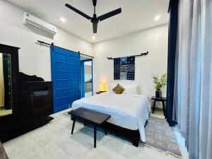 Postel nebo postele na pokoji v ubytování Chez Mimosa Hoi An - LUA Retreat