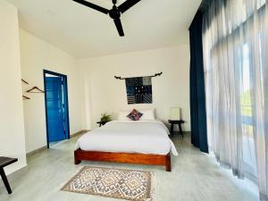 Postel nebo postele na pokoji v ubytování Chez Mimosa Hoi An - LUA Retreat