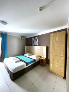 Giường trong phòng chung tại Hôtel Select - Réunion
