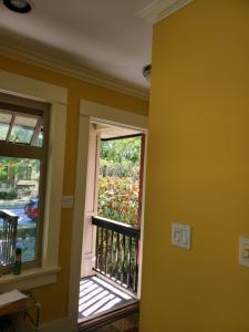 a room with a balcony and a window at Elegant, Sunny Modern Home with Skylights - Kitsilano, Vancouver in Vancouver