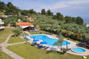an overhead view of a swimming pool at a resort at Kohylia by La Scala Beach in Limenas