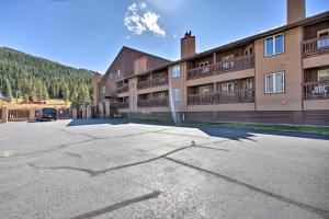 an empty parking lot in front of a building at The Copperado at Copper Valley in Copper Mountain
