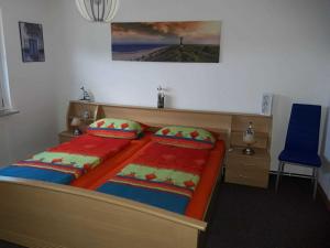 Ένα ή περισσότερα κρεβάτια σε δωμάτιο στο Ruegen Fewo 101