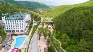 an aerial view of a resort in the mountains at Cam Thermal Resort Hotel & Spa in Kızılcahamam