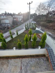 a view of a garden from the roof of a building at TERMAL LUX HOUSE in Yalova