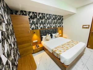 Postel nebo postele na pokoji v ubytování Hotel Lemon Gota