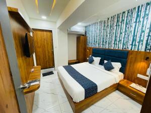 Postel nebo postele na pokoji v ubytování Hotel Lemon Gota