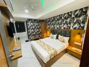 Postel nebo postele na pokoji v ubytování Hotel Lemon Gota